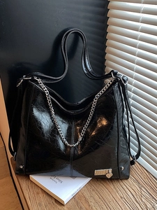 Vintage large black oil wax leather tote bag with silver chain and heart charm detail