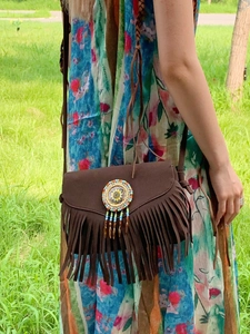 Bohemian dark brown suede fringe crossbody bag with colorful beadwork embroidery detail