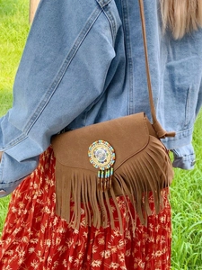 Bohemian brown suede crossbody bag featuring colorful beaded mandala and long fringes