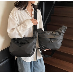 Detailed comparison of large and small black nylon waterproof crossbody dumpling bags