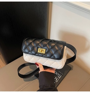 Detail of quilted leather flap with golden twist lock and plush fabric contrast