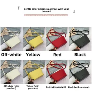 Litchi texture crossbody bucket bag shown in multiple colors with heart charm detail