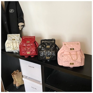 Quilted mini bucket backpacks in white red black and pink with gold chain straps