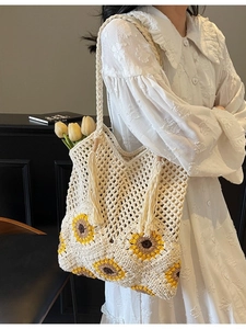 Handmade crochet sunflower straw bag with long tassels for summer beach vacation