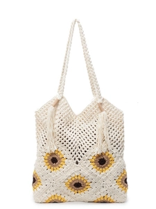 Handmade crochet sunflower straw tote bag with braided straps and fringe tassels