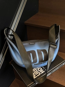 Street style fog blue nylon crossbody bag with black DD logo print and wide strap