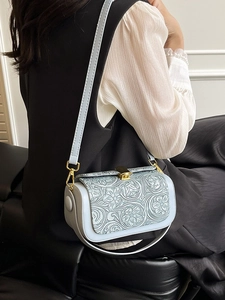 Vintage light blue box bag for women with floral embossing and gold chain strap