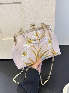 Vintage embroidered qipao handbag in light purple fabric with floral patterns and gold chain