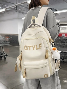 Off-white large capacity student backpack with GTYLF letters and plush duck charm