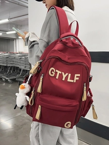 Large capacity burgundy student backpack with cute duck pendant for school travel