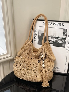 Boho beige woven crochet tote bag with flower pattern, wood beads and tassels decoration