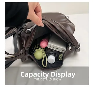 Detail view of large capacity backpack interior showing daily essentials and smooth zipper