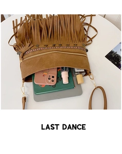 Interior view showing the large capacity of the vintage fringe suede crossbody bag
