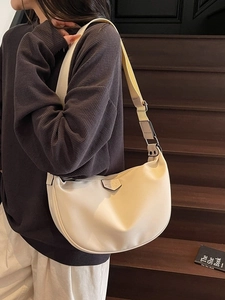 Minimalist beige crescent shoulder bag with wide strap for women daily casual use