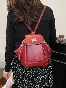 Deep red faux leather large capacity fashion backpack with minimalist metal hardware