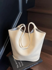 Minimalist cream lychee leather bucket tote bag with long double shoulder straps