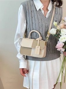 Sac bandoulière bicolore chic pour femme en cuir beige et kaki avec poignée ronde