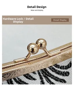 Close-up of golden embossed metal kiss lock and vintage textured jacquard fabric