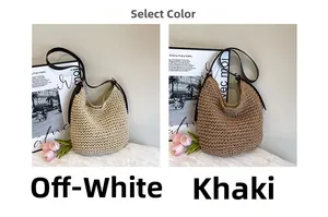 Detail view of woven straw bags in off-white and khaki colors with brown leather straps