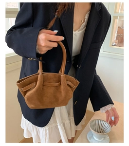 Brown frosted suede tote bag shown with a stylish navy blazer and white lace dress