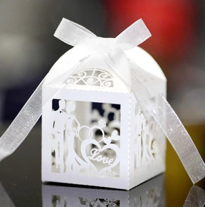 White laser cut wedding candy box with Love heart design and satin ribbon bow