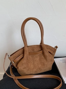 Retro brown suede tote bag with adjustable straps and drawstring detail for women