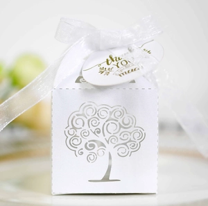 White laser-cut Tree of Life wedding favor box with ribbon and thank you tag
