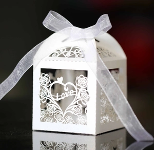 White hollow heart and rose candy gift box with Love engraving and ribbon bow