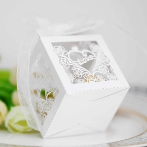Detailed laser-cut white rose gift box with heart love motif and white ribbon bow