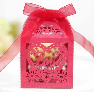 Detailed laser-cut heart and flower pattern with Love script on a red favor gift box