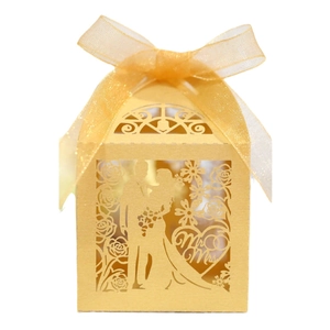 Gold hollow laser-cut wedding candy box with Mr & Mrs heart silhouette and yellow ribbon