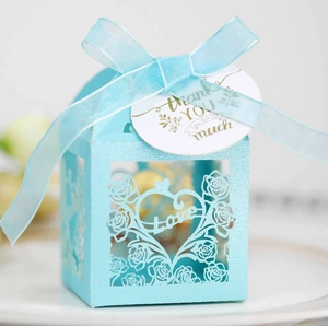 Light blue laser-cut candy gift box with hollow rose pattern and love design