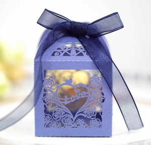 Detailed laser-cut purple candy box featuring a rose heart pattern and Love inscription