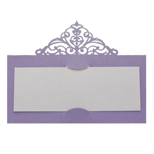 Close-up of laser-cut purple pearlescent place card with an elegant crown lace pattern