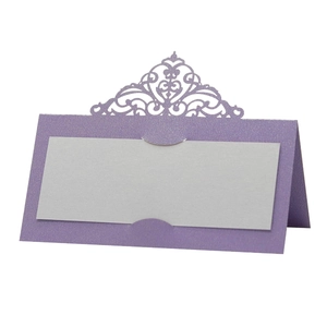 Purple laser-cut crown place card with white insert for wedding table setting