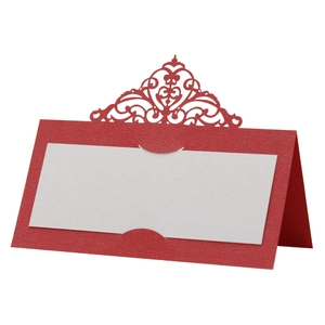 3D laser-cut wedding place cards in red cardstock with elegant hollow crown design