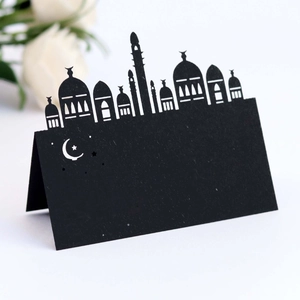 Black laser-cut Ramadan table place cards with mosque silhouette for festive dining