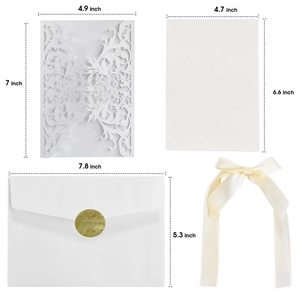 Laser cut rose wedding invitation set with white envelopes and ivory satin ribbons