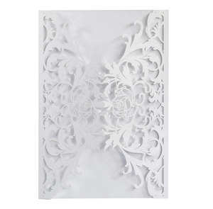 Detail of laser-cut white floral lace pattern on high-quality wedding invitation cover