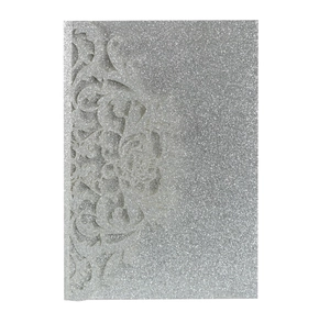 Detailed laser-cut silver glitter wedding invitation cover with intricate floral patterns