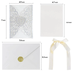 Elegant laser cut heart wedding invitation set with glitter cover and cream ribbon