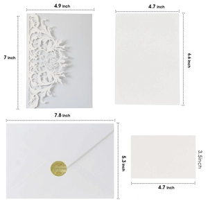 Laser cut white rose wedding invitation set with pearlescent paper and envelopes
