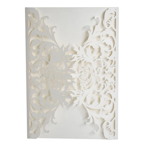 Detailed laser-cut white wedding invitation featuring elegant rose patterns and lace texture