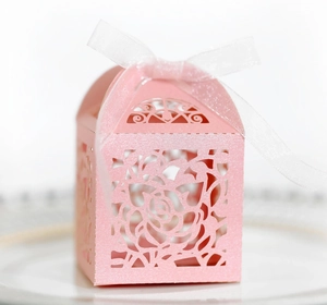 Pink laser cut rose candy box with white velvet ribbon for weddings and parties