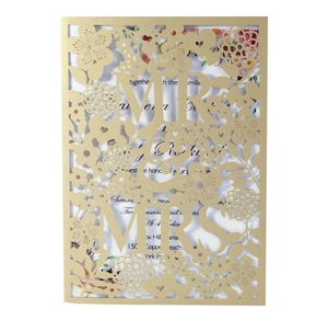 Detailed laser-cut gold pearlescent paper wedding invitation with Mr & Mrs floral design