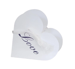 White heart-shaped paper candy box with purple Love text and ribbon for weddings