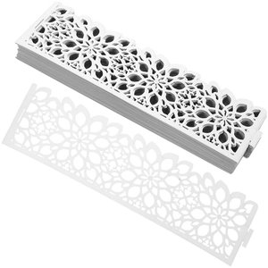 Detailed laser-cut white hollow flower pattern napkin ring with elegant lace design