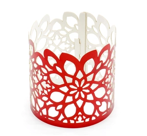 Detail showing laser-cut red mandala floral pattern on a decorative napkin ring