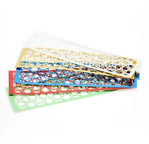 Detailed laser-cut geometric napkin rings in gold, red, blue, green, and white colors