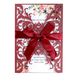 Burgundy laser cut wedding invitation with silk bow and floral inner card set